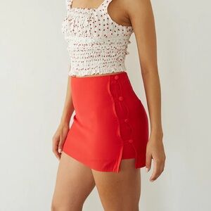 American Threads orange button mini skirt size small